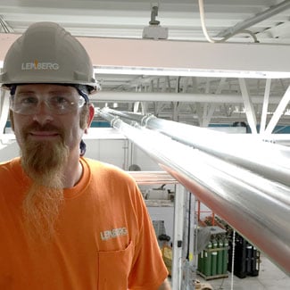 Brandon, electrician on the job at Metalspun