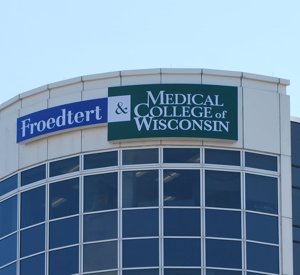 What Are Radius Corner Signs? How Curved Signage Elevates Architectural ...