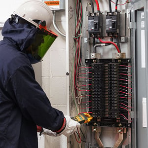 Electrician performing an IR Scan