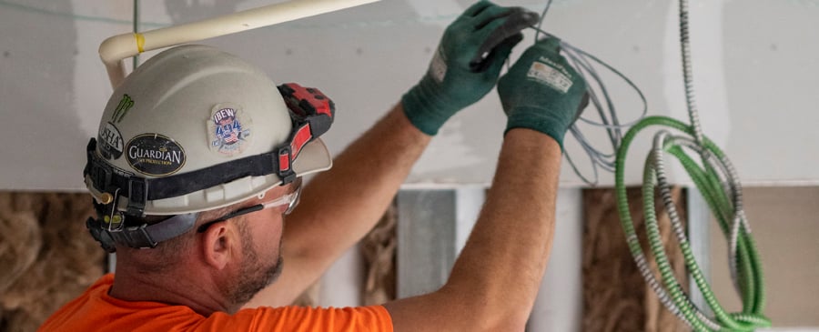 man working with wires