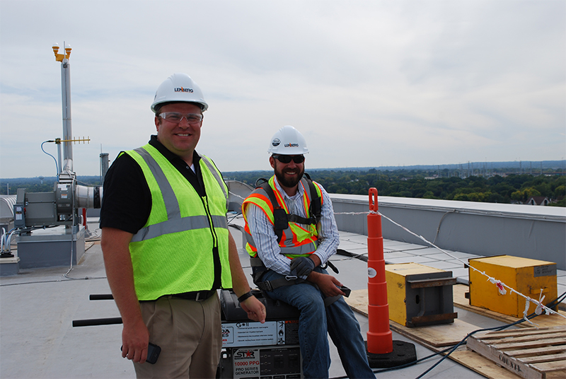 Image of project managers on the rooftop.